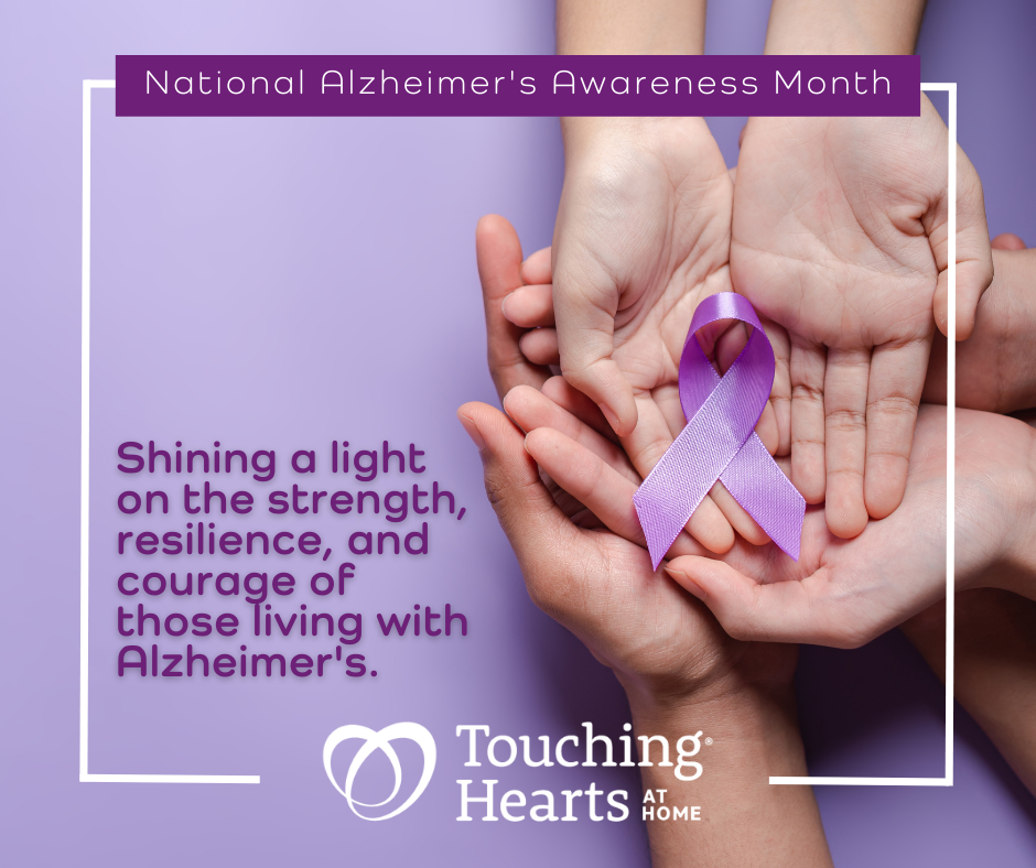 National Alzheimer's Awareness Month. "Shining a light on the strength, resilience, and courage of those living with Alzheimer's" 2 hands holding a purple ribbon. Touching Hearts at home logo.